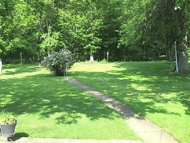 Yard/Garden. Deep, treed yard provides an oasis of