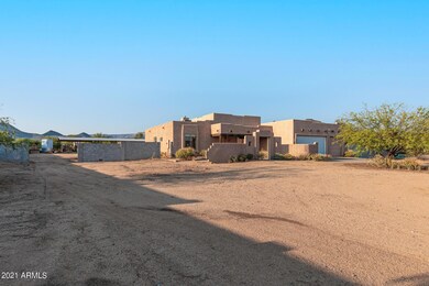 Custom built home with wide gate.