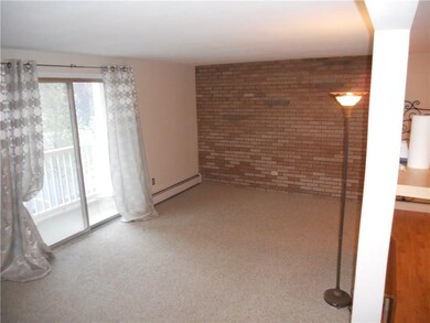 Awesome spacious living room that has sliding door