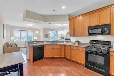Kitchen looking into living room