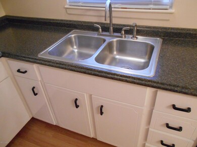 Kitchen with newer counter tops