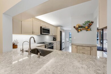 236 Pebble Beach Cir unit 102, Naples, FL 34113 - photo 2