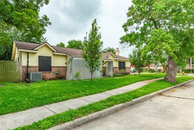 This charming fixer-upper nestled on a spacious co