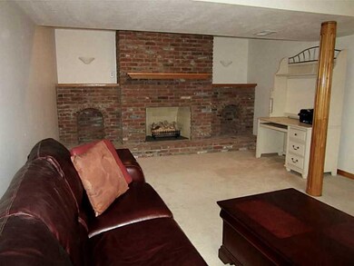 Family Room. Spacious room with neutral carpeting 