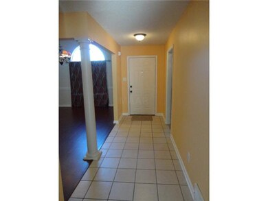 Tile Entry with Soaring ceiling