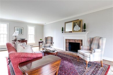 26 X 14 LIVING ROOM WITH WOOD BURNING FIREPLACE.  