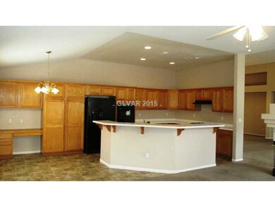 Kitchen. with corian counter top, tile flooring an