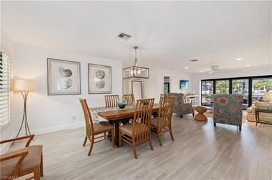Dining and Living areas with all new plank-style h