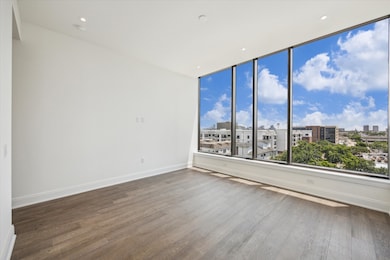 Large primary bedroom has space for king-sized bed