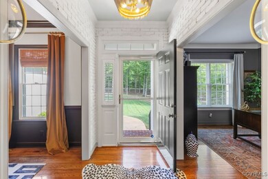 Foyer entrance with healthy amount of natural ligh