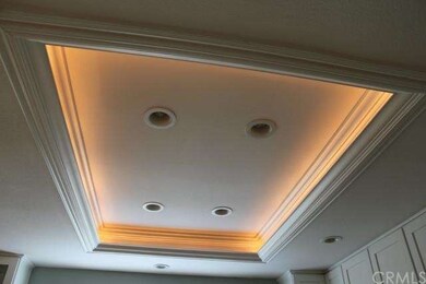Special back lit lighting in crown molding in kitc