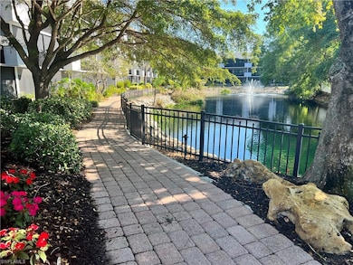 View of patio with a water view