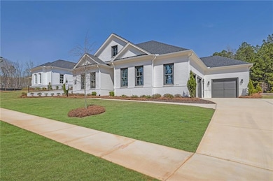 View of front of home featuring brick siding, a fr