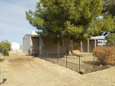 West side of house and entry to backyard