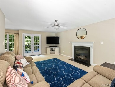 Open family room w/gas fireplace