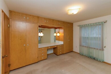 The master bedroom area features many built-in clo