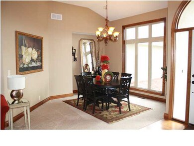 11 ft ceiling in formal living & dining areas.