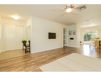 Reverse angle from living room, showing entry foye