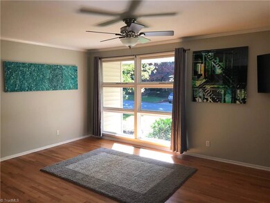 Enjoy the front yard through the large picture window.