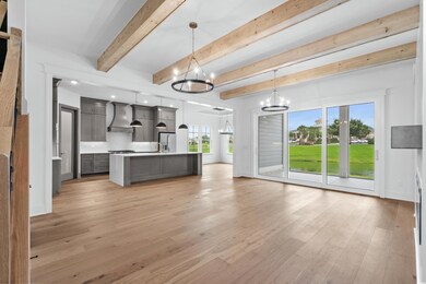 Unfurnished living room with light hardwood / wood