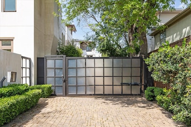 Entrance to group of three patio homes. Large lot size (5,001) with large wrap around gardens.

