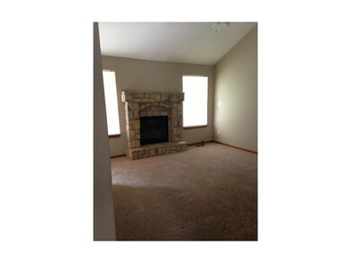 The great room features 10.5' ceilings and windows
