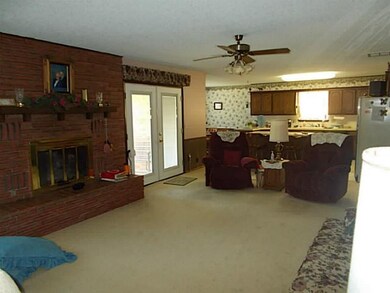 Exterior Front. Den looking towards Kitchen
