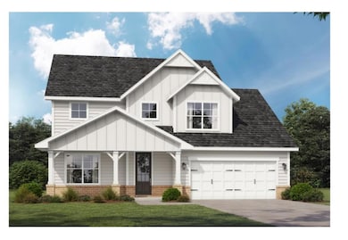 View of front of property featuring brick siding, driveway, a shingled roof, and a front lawn