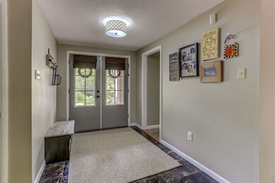 Featuring Marble tile floor and opens to Living Ro