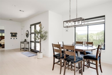 Dining room with baseboards and light wood-style 