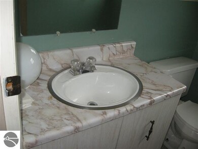 409 Oceana St, Oscoda, MI 48750 - photo 7