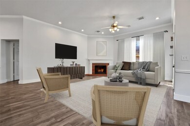 Wood-look tile floors, crown molding, a corner gaslog fireplace, high ceilings, and great natural light are some of the many features to love about this home.