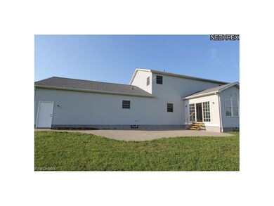 Large patio off the sunroom adds entertainment spa