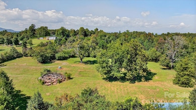Front pasture and old homesite. Entrance is on the left.