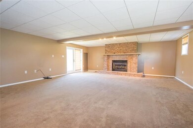 Another view of spacious lower level living space.