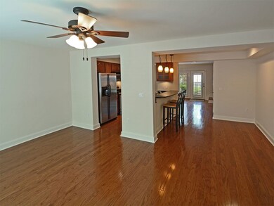 Easy access to kitchen from either of two living/d