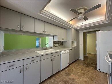 Galley Kitchen with View Into the Living Area/Brea