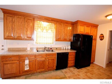 Kitchen is 12x18, has vinyl flooring, and raised p