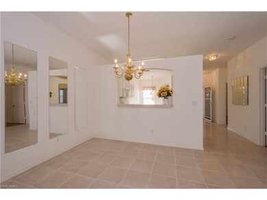 Dining Area View to Kitchen & Entry Hallway