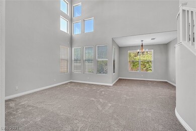 Two story formal living room and dining room.