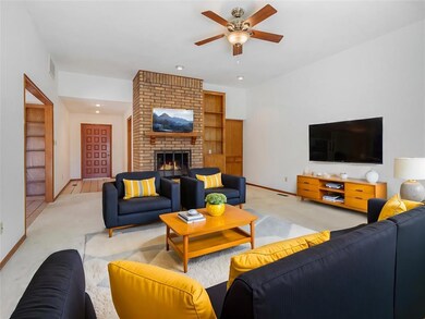 Spacious living room with high ceilings.