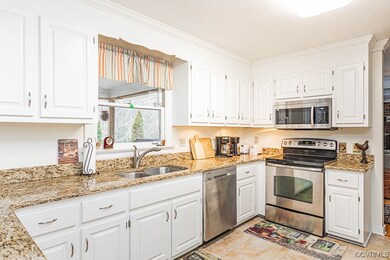 Kitchen with stainless steel appliances, granite c