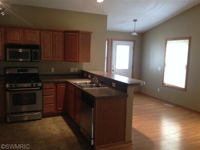 26 Brewer Park Cir unit 2, Byron Center, MI 49315 - photo 2