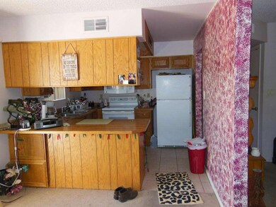Dining area looking into kitchen