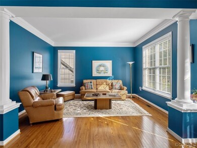 hardwoods, crown molding, large window with natural light