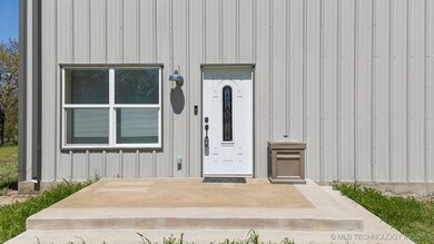 Front porch area with entrance into the home.