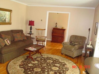 Living room has a large bay window