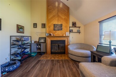 Cathederial ceilings and wood fireplace.