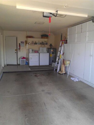 Garage has Washer and Dryer
