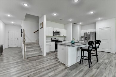 Kitchen featuring stainless steel appliances, rece